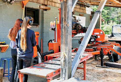 Overseeing lumber mill cutting hemlock boards