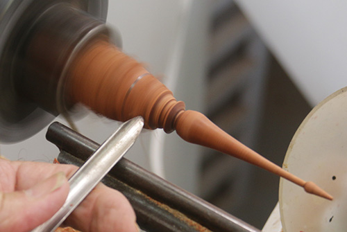 Shaping top portion of ornament finial