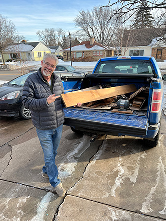 Rob showing off his persimmon lumber