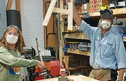 Two volunteer leaders for Saint Paul Minnesota desk building project