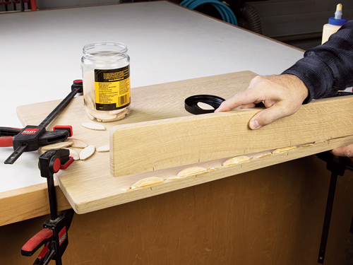 Securing server table backsplash with biscuit joint