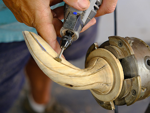 Cut grooves to form lines in pumpkin stem turning